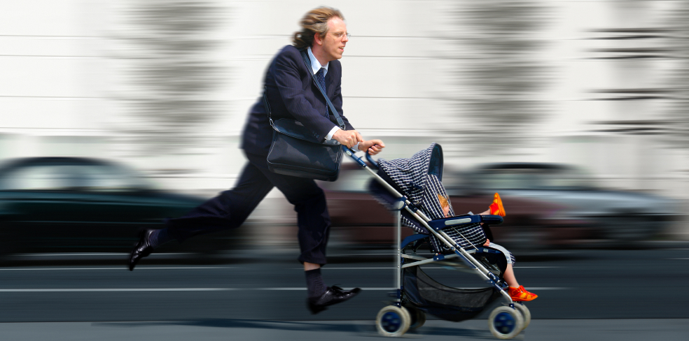 Businessman running with stroller