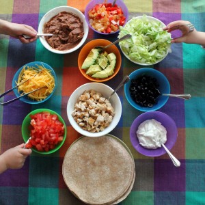 Kids choosing burrito fillings